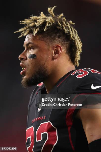 Free safety Tyrann Mathieu of the Arizona Cardinals warms up before the NFL game against the Seattle Seahawks at the University of Phoenix Stadium on...