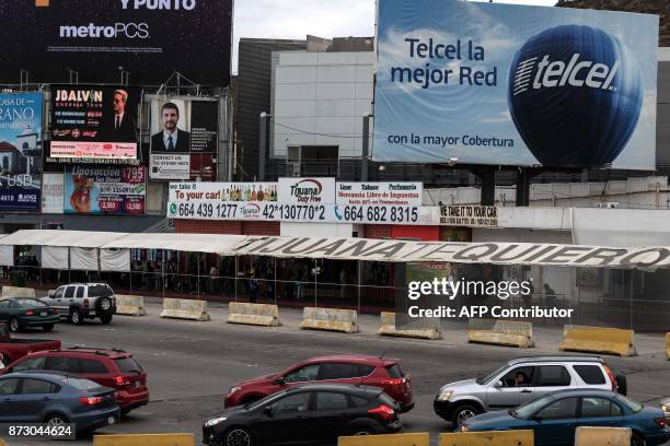 Vehicles and pedestrian crossing lines are seen on the Mexican side of the San Ysidro Port of Entry on November 1 in Tijuana, northwestern Mexico....