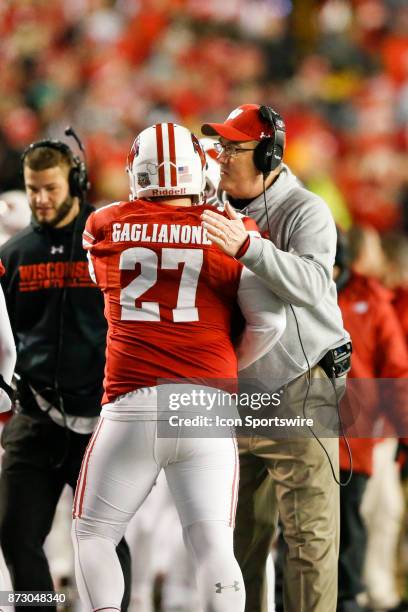 Wisconsin Head Coach congratulates Wisconsin Badger kicker Rafael Gaglianone following a successful point after touchdown kick during a Big Ten...