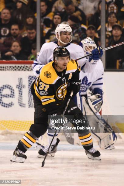 Patrice Bergeron of the Boston Bruins against Nazem Kadri of the Toronto Maple Leafs at the TD Garden on November 11, 2017 in Boston, Massachusetts.