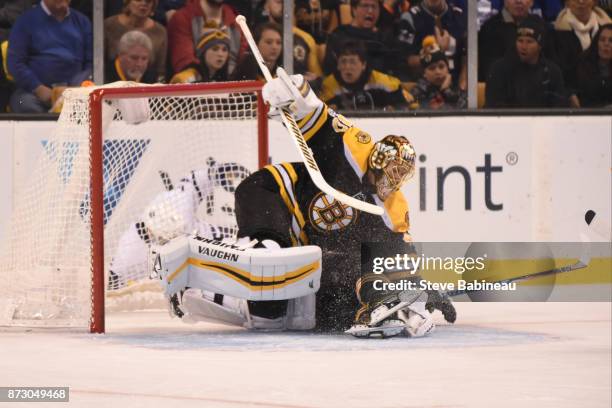 Tuukka Rask of the Boston Bruins collides with a team mate during the second period against the Toronto Maple Leafs at the TD Garden on November 11,...