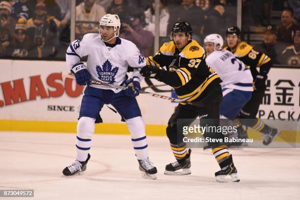 Patrice Bergeron of the Boston Bruins against Nazem Kadri of the Toronto Maple Leafs at the TD Garden on November 11, 2017 in Boston, Massachusetts.