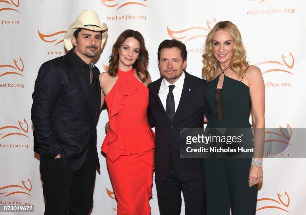 Kimberly Williams Paisley, Brad Paisley, Michael J. Fox and Tracy Pollan on the red carpet of A Funny Thing Happened On The Way To Cure Parkinson's...
