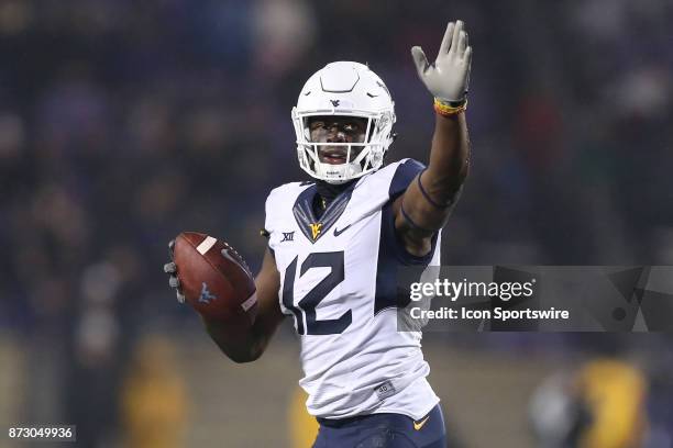 West Virginia Mountaineers wide receiver Gary Jennings gives the first down sign after converting a critical third down with 2:33 left in a Big 12...