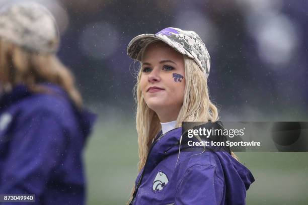 Kansas State cheerleader on a cold, drizzly day before a Big 12 game between the West Virginia Mountaineers and Kansas State Wildcats on November 11,...