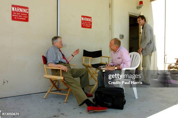 English artist David Hockney is interviewed by Ralf Hoppe of Der Spiegel on set during the taping of an upcoming television documentary for the BBC...