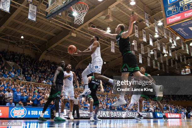 Trevon Duval of the Duke Blue Devils goes to the basket against the Utah Valley Wolverines at Cameron Indoor Stadium on November 11, 2017 in Durham,...