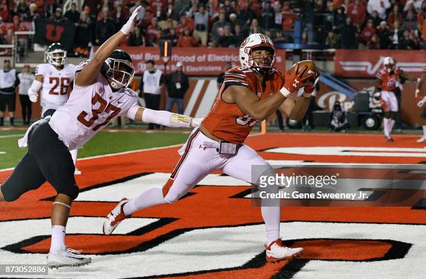 Siale Fakailoatonga of the Utah Utes makes a catch for a two point conversion in the thirds quarter of their 33-25 loss to the Washington State...