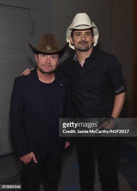 Michael J. Fox and Brad Paisley attend A Funny Thing Happened On The Way To Cure Parkinson's at the Hilton New York on November 11, 2017 in New York...