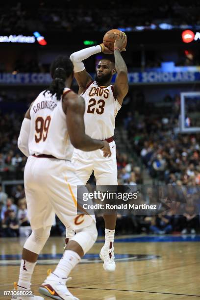 LeBron James of the Cleveland Cavaliers takes a shot against the Dallas Mavericks in the second quarter at American Airlines Center on November 11,...