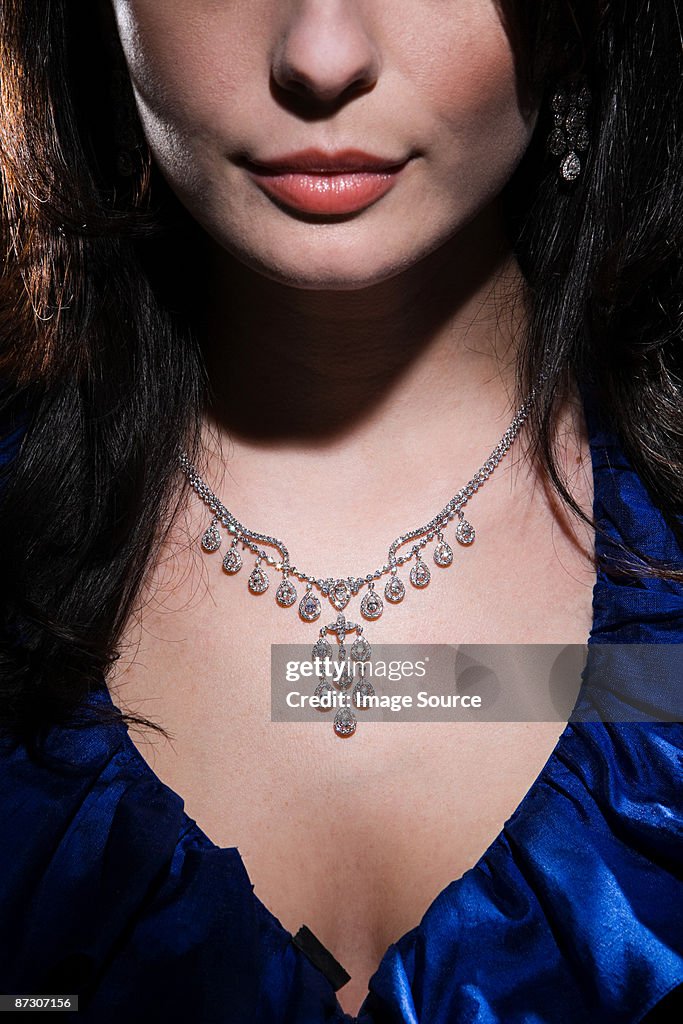 Woman wearing diamond necklace