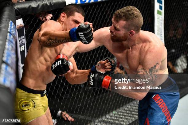 Nate Marquardt punches Cezar Ferreira of Brazil in their middleweight bout during the UFC Fight Night event inside the Ted Constant Convention Center...