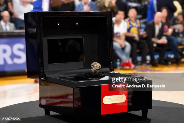 The 2017 NBA Championship ring is presented to James Michael McAdoo of the Philadelphia 76ers before the game against the Golden State Warriors on...