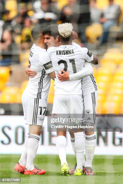 Gui Finkler of the Phoenix celebrates with Roy Krishna and Ali Abbas after scoring a goal during the round six A-League match between the Wellington...