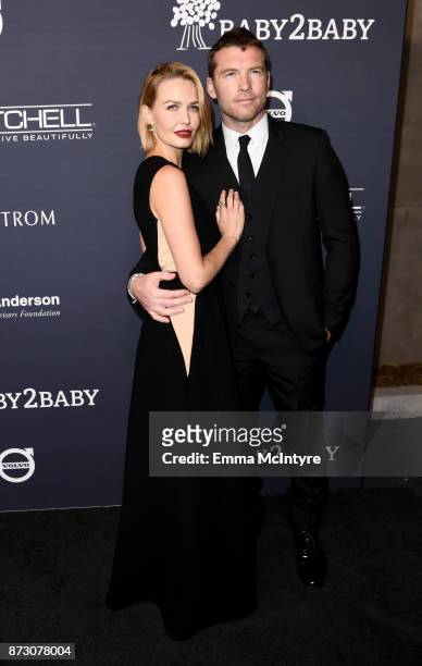 Lara Bingle and Sam Worthington attend The 2017 Baby2Baby Gala presented by Paul Mitchell on November 11, 2017 in Los Angeles, California.
