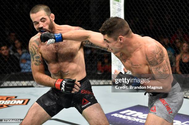 Diego Sanchez punches Matt Brown in their welterweight bout during the UFC Fight Night event inside the Ted Constant Convention Center on November...