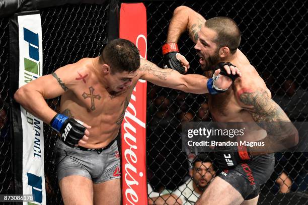 Matt Brown throws an elbow against Diego Sanchez in their welterweight bout during the UFC Fight Night event inside the Ted Constant Convention...