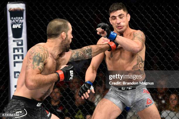 Matt Brown punches Diego Sanchez in their welterweight bout during the UFC Fight Night event inside the Ted Constant Convention Center on November...