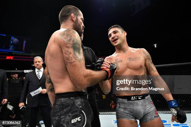 Matt Brown and Diego Sanchez embrace after facing each other in their welterweight bout during the UFC Fight Night event inside the Ted Constant...