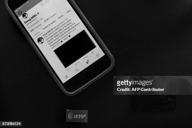My cell phone showing the Tweet that New York Times photographer and member of the White House Correspondents Association Doug Mills sent out in...
