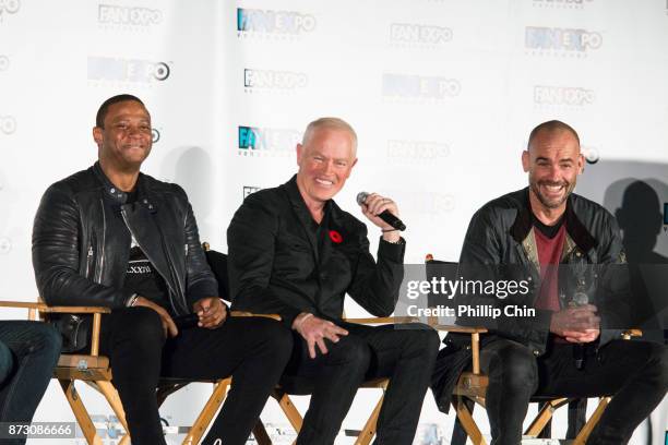 Actors David Ramsey, Neal McDonough and Paul Blackthorne attend 'The Arrow" Q&A at Fan Expo Vancouver in the Vancouver Convention Centre on November...