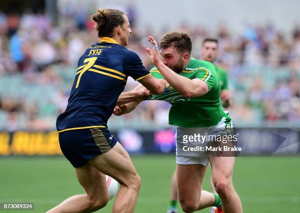 Nat Fyfe of Australia and Aidan O'Shea of Ireland come to blows during game one of the International Rules Series between Australia and Ireland at...