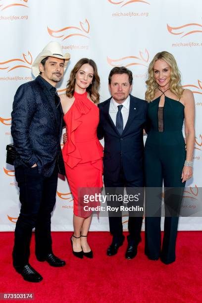 Brad Paisley, Kimberly Williams-Paisley, Michael J. Fox and Tracy Pollan attend the 2017 a funny thing happened on the way to cure Parkinson's...