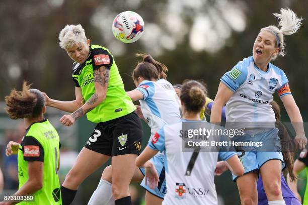 Michelle Heyman of Canberra heads a corner kick during the round three W-League match between Canberra United and Sydney FC at McKellar Park on...