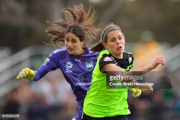 Ashleigh Sykes of Canberra collides with Shamiran Khamis of Sydney during the round three W-League match between Canberra United and Sydney FC at...