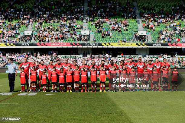 Wales line up for the National Anthem before the 2017 Rugby League World Cup match between Wales and Ireland at nib Stadium on November 12, 2017 in...