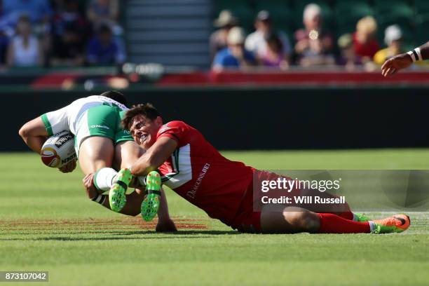 Api Pewhairangi of Ireland is tackled by Michael Channing of Wales during the 2017 Rugby League World Cup match between Wales and Ireland at nib...