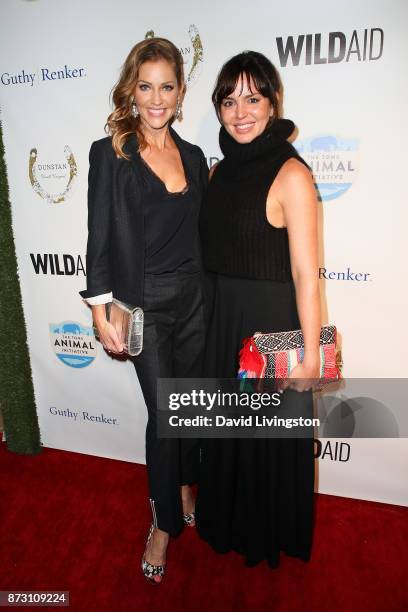 Tricia Helfer and Marta Milans arrive at the Evening with WildAid at the Beverly Wilshire Four Seasons Hotel on November 11, 2017 in Beverly Hills,...