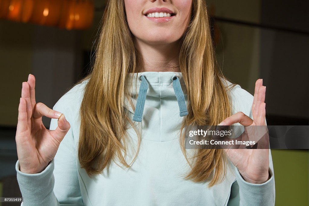 A young woman meditating