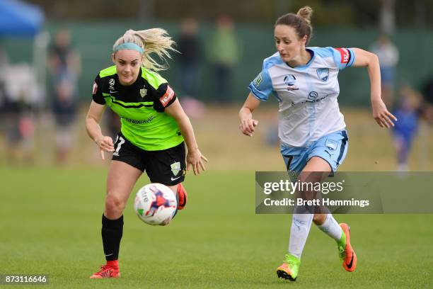 Ellie Carpenter of Canberra and Rachel Soutar of Sydney contest the ball during the round three W-League match between Canberra United and Sydney FC...