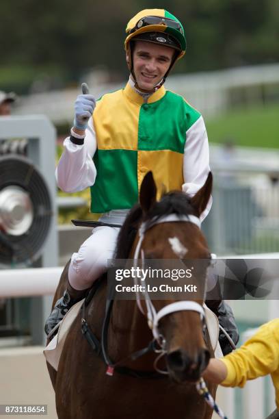 Jockey Sam Clipperton riding Sparkling Dragon wins Race 5 Panasonic 4k Oled TV Handicap at Sha Tin racecourse on November 11, 2017 in Hong Kong, Hong...