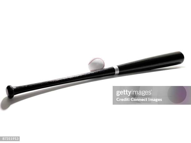 baseball bat and ball - baseballschläger stock-fotos und bilder
