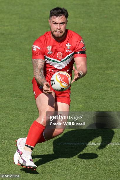 Ben Evans of Wales passes the ball during the 2017 Rugby League World Cup match between Wales and Ireland at nib Stadium on November 12, 2017 in...