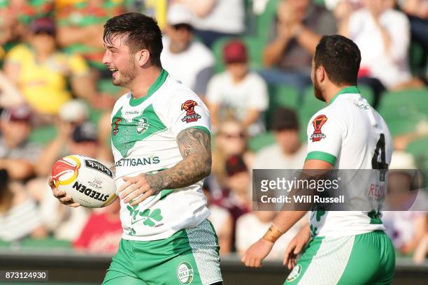 Oliver Roberts of Ireland celebrates a try during the 2017 Rugby League World Cup match between Wales and Ireland at nib Stadium on November 12, 2017...