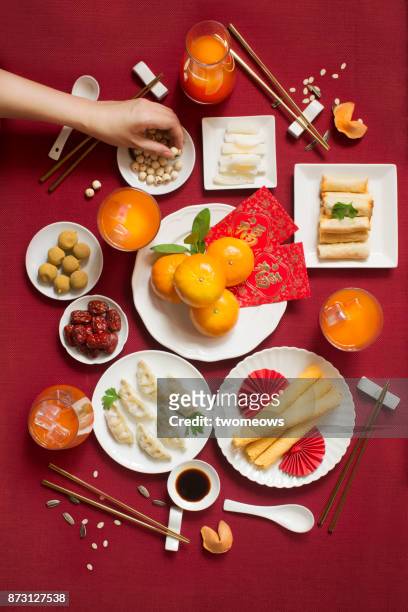 flat lay chinese new year food and drink still life. - lunar new year cup 2017 stock-fotos und bilder