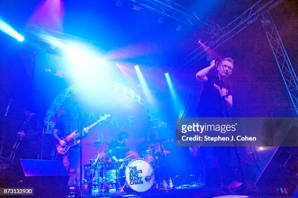 Scott Von RyperÊ, Mark Crozer, Brian Young, Jim Reid, and William Reid of The Jesus And Mary Chain performs at Headliners Music Hall on November 11,...
