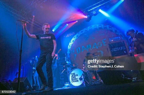 Scott Von RyperÊ, Mark Crozer, Brian Young, Jim Reid, and William Reid of The Jesus And Mary Chain performs at Headliners Music Hall on November 11,...