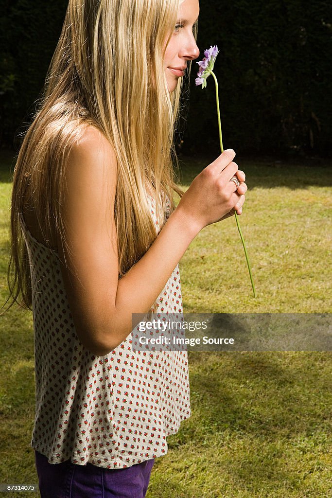 Young woman with flower