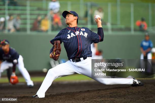 Shota Imanaga of Samurai Japan throws a pitch during the practice game between Japan and Hokkaido Nippon Ham Fighters at Sokken Stadium on November...