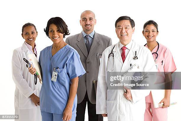 portrait of doctors and nurses - group health workers white background fotografías e imágenes de stock