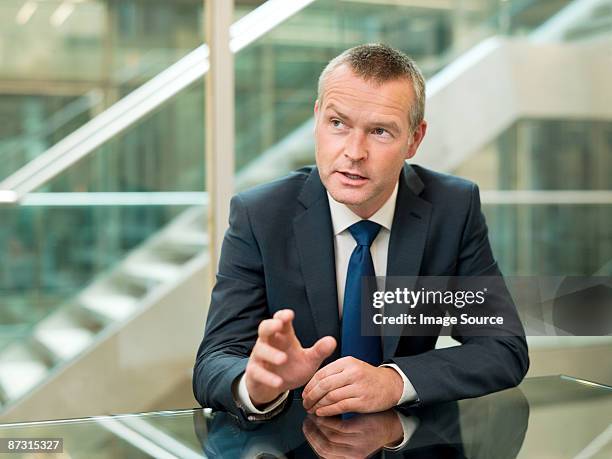 businessman talking - male portrait suit and tie 40 year old stock pictures, royalty-free photos & images