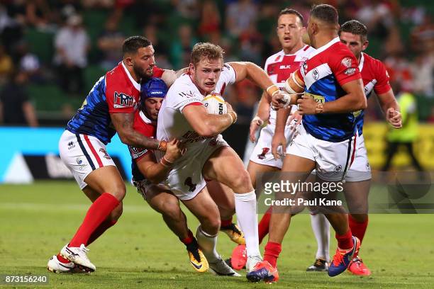 Thomas Burgess of England runs the ball during the 2017 Rugby League World Cup match between England and France at nib Stadium on November 12, 2017...