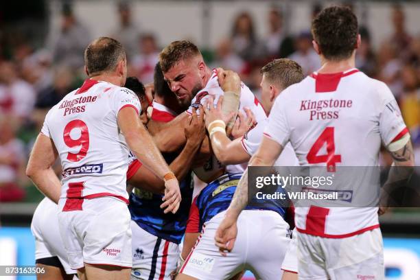 Mike McMeeken of England is tackled during the 2017 Rugby League World Cup match between England and France at nib Stadium on November 12, 2017 in...