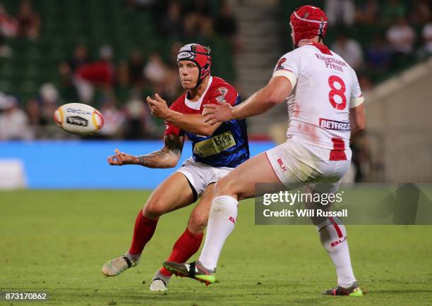 Theo Fages of France passes the ball during the 2017 Rugby League World Cup match between England and France at nib Stadium on November 12, 2017 in...