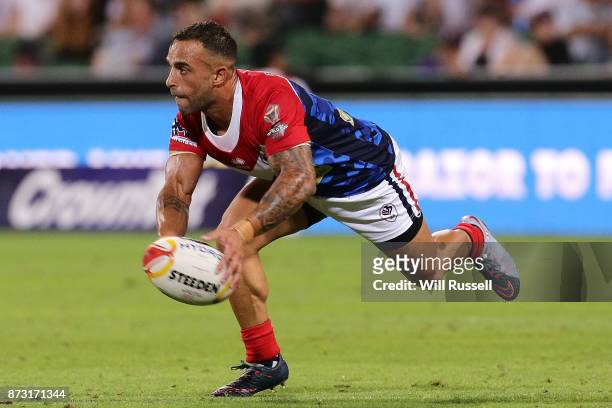 John Boudebza of France passes the ball during the 2017 Rugby League World Cup match between England and France at nib Stadium on November 12, 2017...