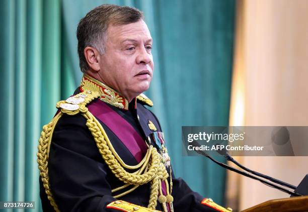 Jordan's King Abdullah II delivers a speech as he opens the regular parliament session in the capital Amman on November 12, 2017. / AFP PHOTO /...